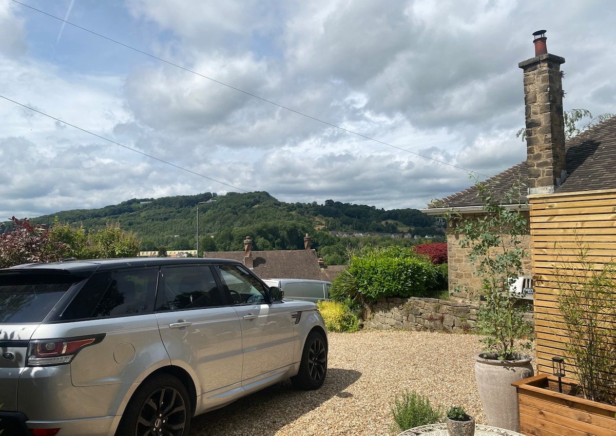 Parking space beside the cabin with views over the Derbyshire hills